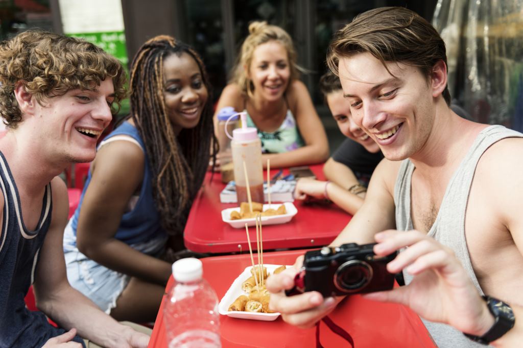 tourists enjoy street food on khaosan road