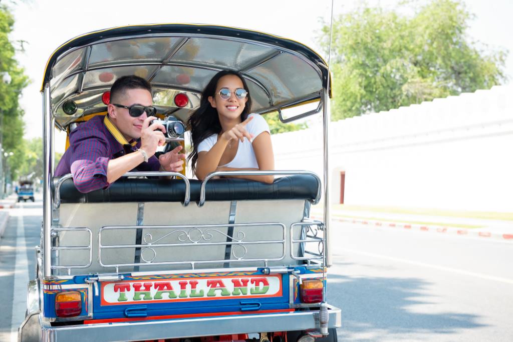  Couple on tuk-tuk ride in Bangkok